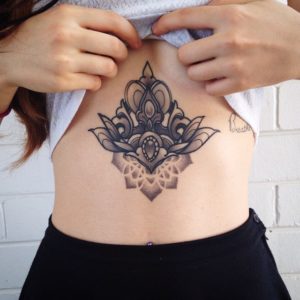 inked-girl-chest-tattoo
